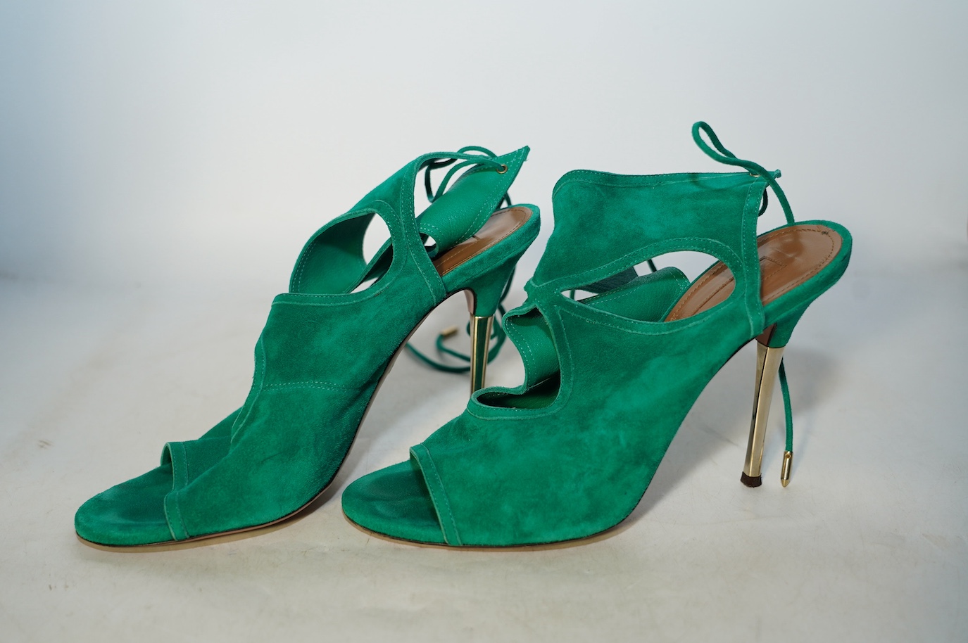 A pair of Aquazzura emerald suede open toe heels, in original box, size 41